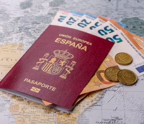 Conceptual background for travel with passport, magnifying glass, world map and money. Wallpaper for your design